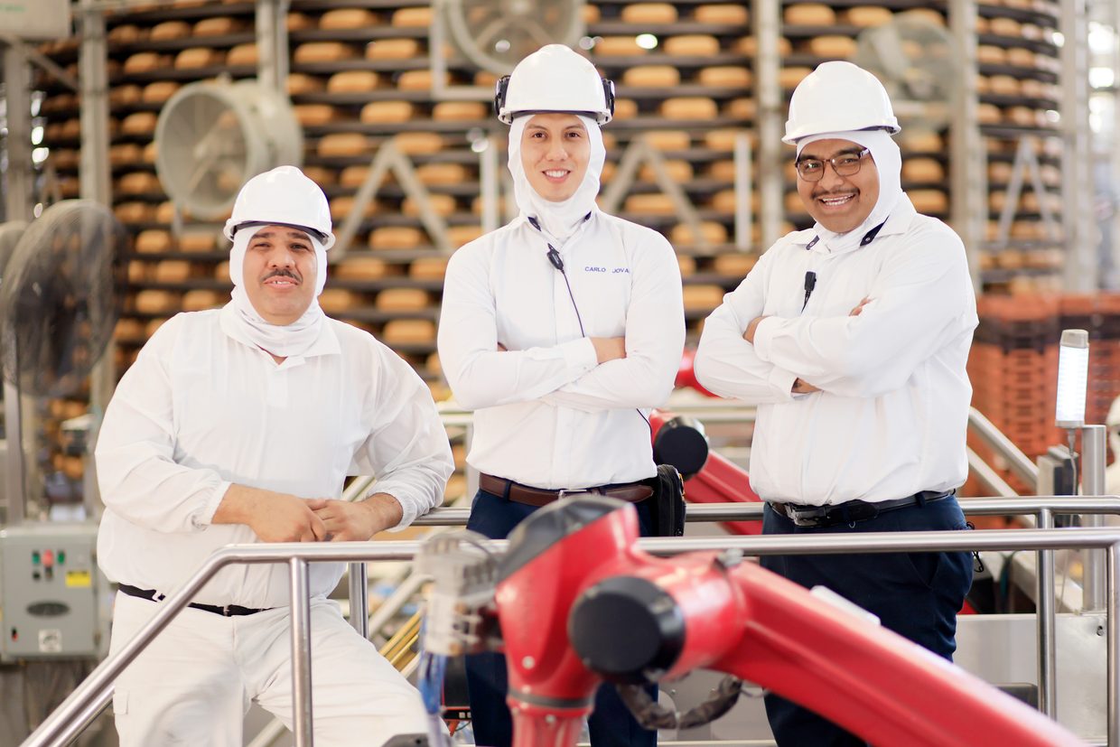 Bimbo associates at a production facility