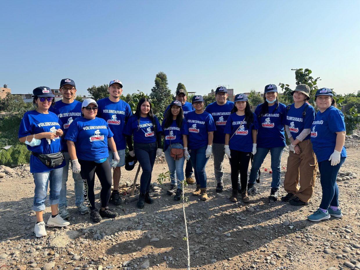 Bimbo associates at a community clean-up and tree-planting day